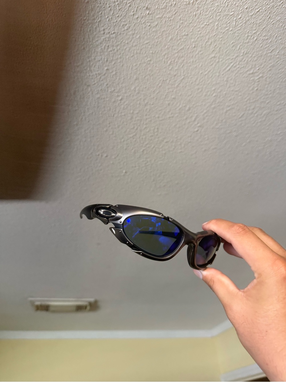 Oakley Men’s Black Sunglasses with Blue Lenses